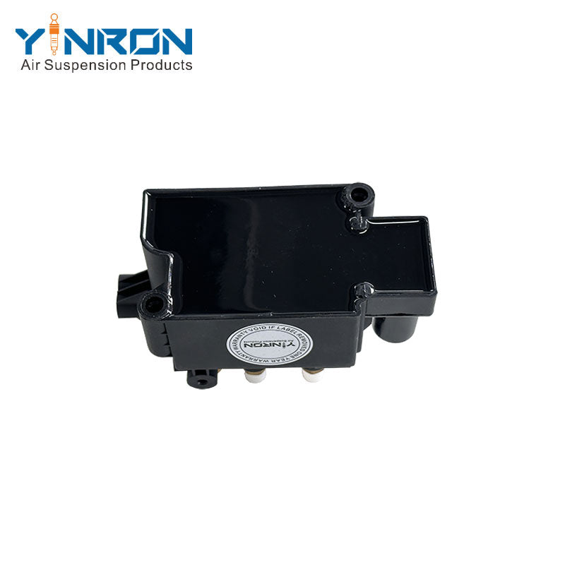 Bottom view of Tesla Model X 5YJX air suspension valve block (1027919-00-B)