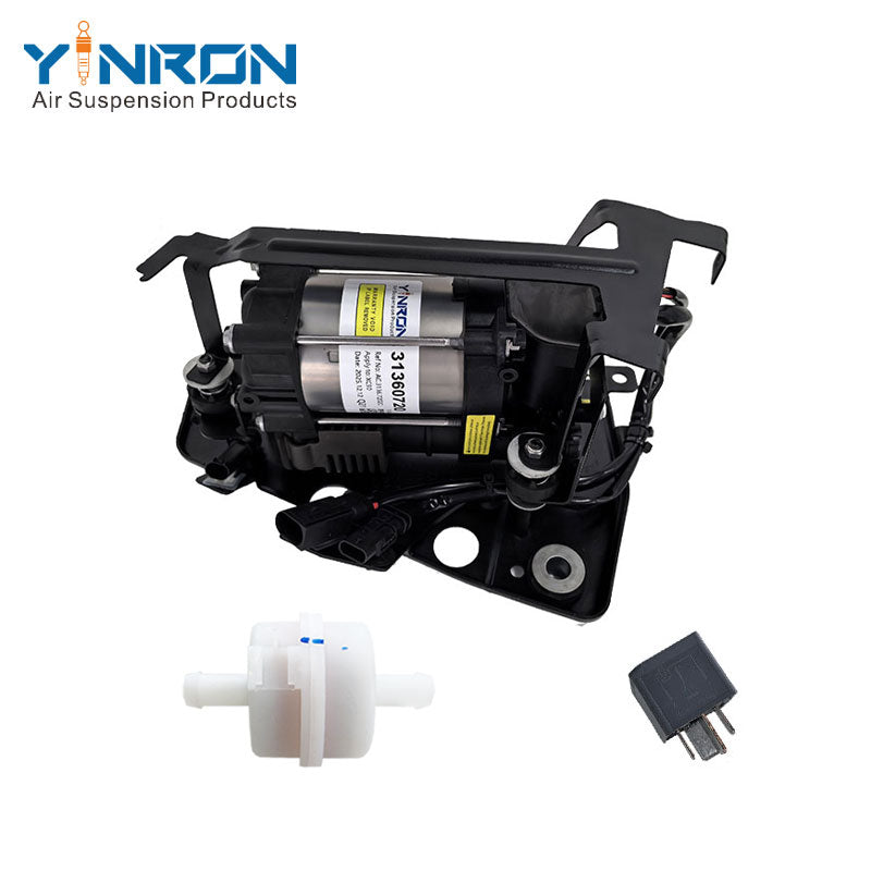 Vertical top-down overhead view of Volvo air suspension compressor pump 31360720 32315091 with relay and air filter assembly