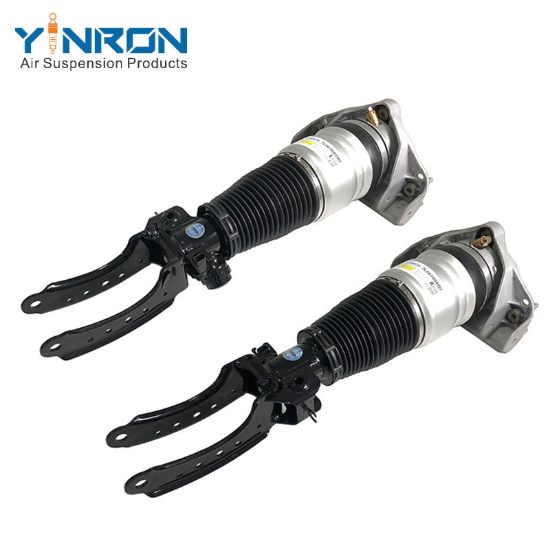 Perspective view of left and right VW Touareg I 7L front air suspension struts with ADS (7L6616039D & 7L6616040D)
