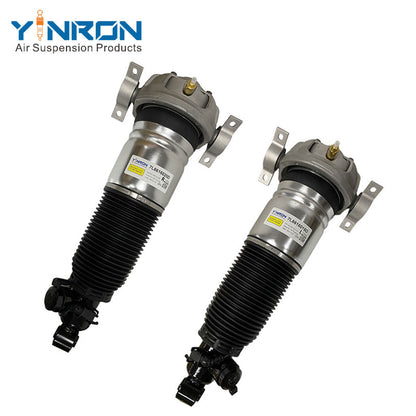 45 degree pair shot of dual rear CDC electronic air struts compatible with VW Touareg I 7L 2003-2010, part 7L6616019D + 7L6616020D