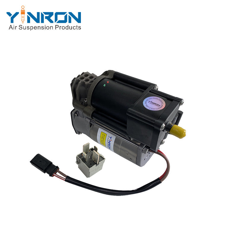 45‑degree angled view of Mercedes‑Benz air suspension compressor pump A0993200004 with relay