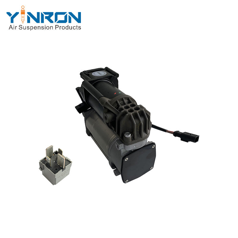 Close‑up detail view of Mercedes‑Benz air suspension compressor pump A0993200004 with relay, relay assembly & connector
